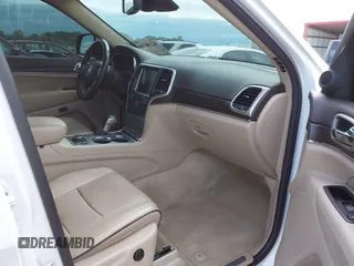 2016 Jeep Grand Cherokee Overland with VIN 1C4RJFCG2GC490420, listed as a IAAI auction lot 42200700 with 97,007 mi miles and . Bid and sale history available at DreamBid. Image 5.