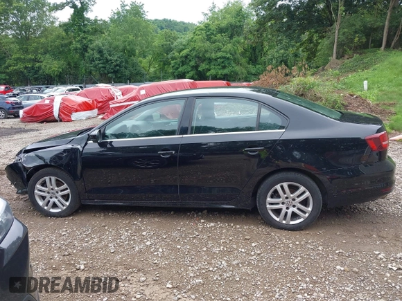 2017 Volkswagen Jetta S z VIN 3VW2B7AJ3HM303198, wystawiony jako IAAI lot #42651056 z przebiegiem 126 253 mil mil oraz . Historia ofert i sprzedaży dostępna na DreamBid. Obrazek 15.