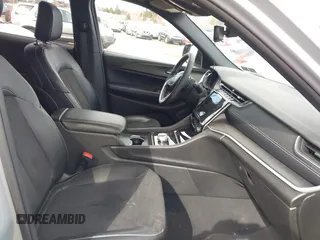 2023 Jeep Grand Cherokee Laredo with VIN 1C4RJHAG2PC660418, listed as a IAAI auction lot 41693879 with 4,295 mi miles and . Bid and sale history available at DreamBid. Image 5.