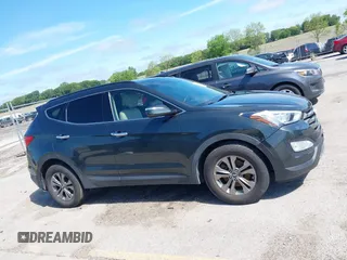 2014 Hyundai Santa Fe with VIN 5XYZUDLB0EG187984, listed as a IAAI auction lot 42607599 with 111,594 mi miles and . Bid and sale history available at DreamBid. Image 13.