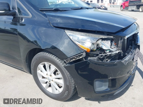 2015 Kia Sedona LX with VIN KNDMB5C17F6069139, listed as a IAAI auction lot 42064125 with 226,244 mi miles and . Bid and sale history available at DreamBid. Image 12.