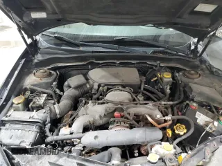 2009 Subaru Impreza i z VIN JF1GH60669H817203, wystawiony jako Copart lot #58482215 z przebiegiem 124 184 mil mil oraz Szkoda całkowita • Salvage title. Historia ofert i sprzedaży dostępna na DreamBid. Obrazek 11.