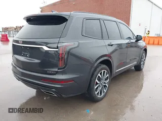 2023 Cadillac XT6 AWD Sport with VIN 1GYKPGRS0PZ177620, listed as a IAAI auction lot 42432423 with 24,070 mi miles and . Bid and sale history available at DreamBid. Image 4.