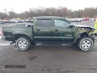 2013 Toyota Tacoma with VIN 3TMLU4EN3DM123470, listed as a IAAI auction lot 41952721 with 72,296 mi miles and . Bid and sale history available at DreamBid. Image 13.