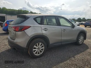 2014 Mazda CX-5 Sport with VIN JM3KE2BE7E0350965, listed as a Copart auction lot 60130195 with 196,072 mi miles and Clean title. Bid and sale history available at DreamBid. Image 3.