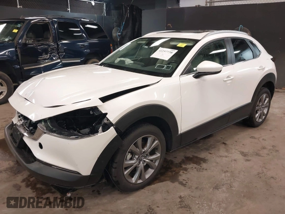 2024 Mazda CX-30 S Carbon Edition z VIN 3MVDMBCM4RM657165, wystawiony jako IAAI lot #42297738 z przebiegiem 7 041 mil mil oraz . Historia ofert i sprzedaży dostępna na DreamBid. Obrazek 18.