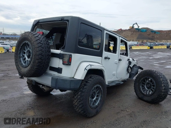 2015 Jeep Wrangler Unlimited Sahara with VIN 1C4BJWEG5FL518191, listed as a IAAI auction lot 41914581 with 107,433 mi miles. Bid and sale history available at carsss.com. Image 4.