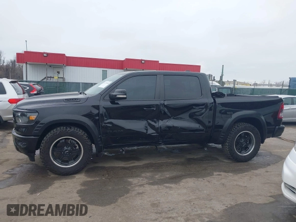 2022 Ram 1500 Big Horn with VIN 1C6SRFFT3NN287385, listed as a IAAI auction lot 41793596 with 12,277 mi miles and . Bid and sale history available at DreamBid. Image 15.
