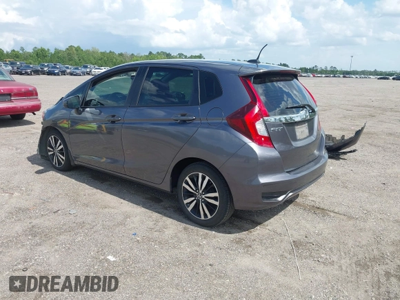 2019 Honda Fit EX z VIN 3HGGK5H89KM736677, wystawiony jako IAAI lot #42443401 z przebiegiem 58 559 mil mil oraz . Historia ofert i sprzedaży dostępna na DreamBid. Obrazek 3.