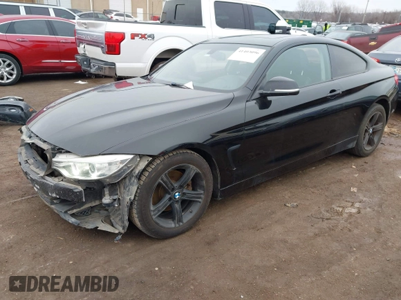 2014 BMW 4 Series 428i with VIN WBA3N7C50EF718339, listed as a IAAI auction lot 41403096 with 143,478 mi miles and . Bid and sale history available at carsss.com. Image 18.