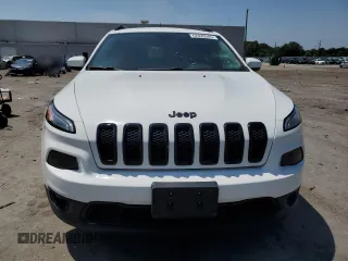 2016 Jeep Cherokee Altitude with VIN 1C4PJLCB8GW207480, listed as a Copart auction lot 62026585 with 124,229 mi miles and Salvage title. Bid and sale history available at DreamBid. Image 5.
