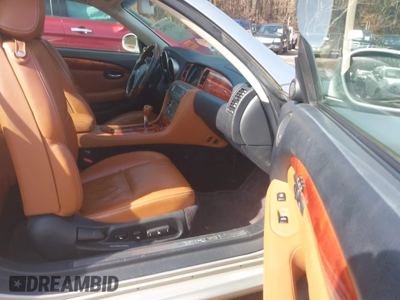 2005 Lexus SC 430 z VIN JTHFN48Y350061488, wystawiony jako IAAI lot #41437562 z przebiegiem 146 442 mil mil oraz . Historia ofert i sprzedaży dostępna na DreamBid. Obrazek 5.