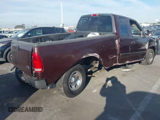 2000 Ford F-150 XL with VIN 1FTRX17L2YNB78032, listed as a IAAI auction lot 41687215 with 1 mi miles. Bid and sale history available at carsss.com. Image 4.