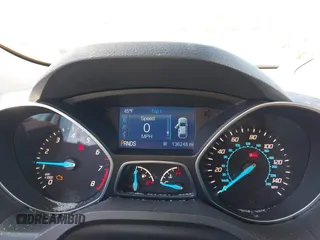 2015 Ford Escape SE with VIN 1FMCU9GX2FUB68101, listed as a IAAI auction lot 41902379 with 136,248 mi miles. Bid and sale history available at carsss.com. Image 7.
