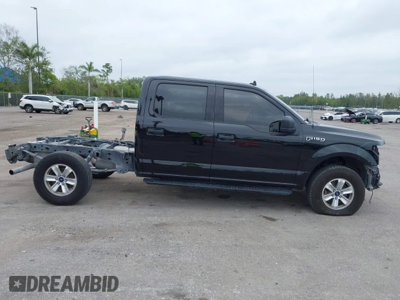 2019 Ford F-150 XL with VIN 1FTFW1E56KFB72035, listed as a IAAI auction lot 41974489 with 116,136 mi miles. Bid and sale history available at carsss.com. Image 14.