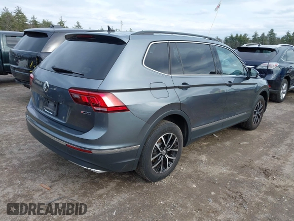 2021 Volkswagen Tiguan SE with VIN 3VV2B7AX6MM054611, listed as a IAAI auction lot 41978323 with 23,029 mi miles and . Bid and sale history available at DreamBid. Image 4.