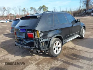 2011 BMW X5 35i z VIN 5UXZV4C52BL739488, wystawiony jako IAAI lot #41199011 z przebiegiem 193 403 mil mil oraz . Historia ofert i sprzedaży dostępna na DreamBid. Obrazek 4.