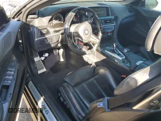 2013 BMW M6 z VIN WBSLZ9C56DDZ77892, wystawiony jako Copart lot #52102785 z przebiegiem 94 380 mil mil oraz Szkoda całkowita • Salvage title. Historia ofert i sprzedaży dostępna na DreamBid. Obrazek 8.