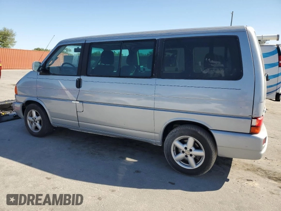 2002 Volkswagen EuroVan с VIN WV2KB47012H065431, выставлен на аукционе Copart как лот 49010445 с пробегом 78 985 миль миль и Чистый • Clean title. История ставок и продаж доступна на DreamBid. Изображение 2.