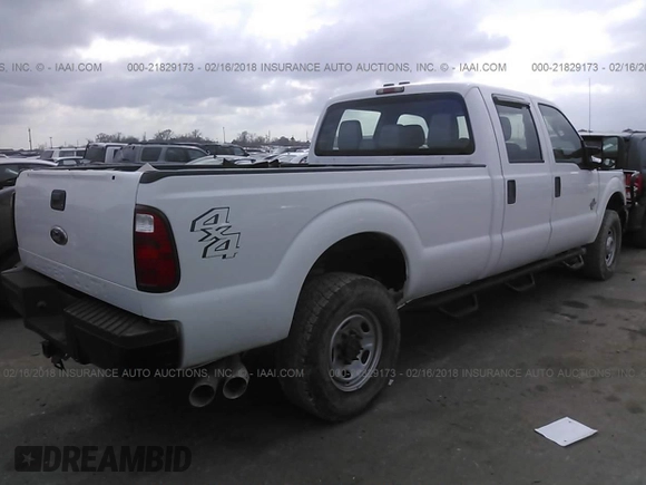 2011 Ford Super Duty F-250 SRW XL with VIN 1FT7W2BT0BEA38303, listed as a IAAI auction lot 21829173 with 164,885 mi miles. Bid and sale history available at carsss.com. Image 4.