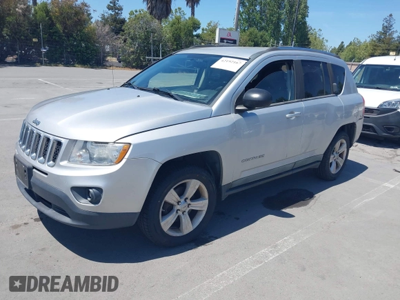 2011 Jeep Compass Latitude with VIN 1J4NF1FB6BD218694, listed as a IAAI auction lot 42192167 with 155,012 mi miles and . Bid and sale history available at DreamBid. Image 2.