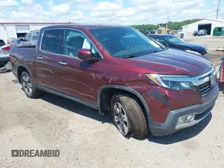 2019 Honda Ridgeline RTL-E with VIN 5FPYK3F72KB031085, listed as a IAAI auction lot 42236249 with 73,612 mi miles and . Bid and sale history available at DreamBid. Image 1.
