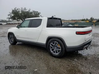 2023 Rivian R1T Adventure with VIN 7FCTGAAA2PN021915, listed as a Copart auction lot 46351415 with Not Provided miles and Non Repairable. Bid and sale history available at carsss.com. Image 2.