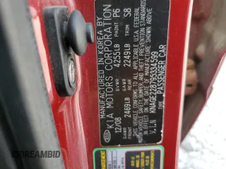 2009 Kia Optima LX z VIN KNAGE228795334599, wystawiony jako Copart lot #59276515 z przebiegiem 180 399 mil mil oraz Szkoda całkowita • Salvage title. Historia ofert i sprzedaży dostępna na DreamBid. Obrazek 13.