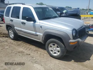 2003 Jeep Liberty Sport z VIN 1J4GK48K43W657028, wystawiony jako Copart lot #55070315 z przebiegiem 243 019 mil mil oraz Szkody całkowita. Historia ofert i sprzedaży dostępna na DreamBid. Obrazek 4.