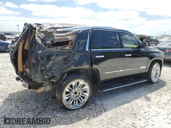 2016 Cadillac Escalade Platinum z VIN 1GYS4DKJ0GR165640, wystawiony jako Copart lot #52453805 z przebiegiem 103 086 mil mil oraz Szkoda całkowita • Salvage title. Historia ofert i sprzedaży dostępna na DreamBid. Obrazek 3.