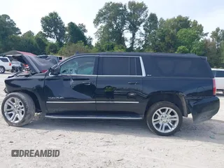2019 GMC Yukon XL SLT with VIN 1GKS2GKCXKR359166, listed as a IAAI auction lot 40546837 with Not provided miles and . Bid and sale history available at DreamBid. Image 14.