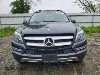 2015 Mercedes-Benz GL 450 z VIN 4JGDF6EE7FA455093, wystawiony jako Copart lot #57187135 z przebiegiem 105 573 mil mil oraz Tytuł czysty. Historia ofert i sprzedaży dostępna na DreamBid. Obrazek 5.