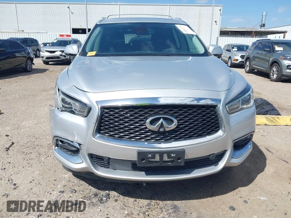 2019 Infiniti QX60 LUXE with VIN 5N1DL0MN8KC526839, listed as a IAAI auction lot 41811271 with 83,729 mi miles. Bid and sale history available at carsss.com. Image 12.