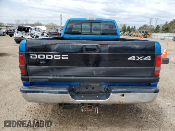 2001 Dodge 2500 z VIN 3B7KC26Z21M557430, wystawiony jako Copart lot #53995215 z przebiegiem 185 131 mil mil oraz Szkoda całkowita • Salvage title. Historia ofert i sprzedaży dostępna na DreamBid. Obrazek 6.