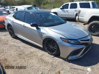 2022 Toyota Camry TRD with VIN 4T1KZ1AK8NU061810, listed as a IAAI auction lot 41769584 with 79,709 mi miles and . Bid and sale history available at DreamBid. Image 1.