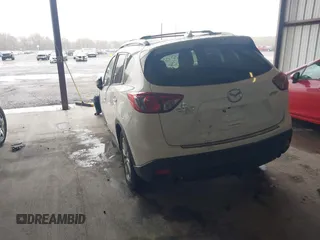 2014 Mazda CX-5 Touring with VIN JM3KE4CY9E0370610, listed as a IAAI auction lot 42016896 with 72,340 mi miles. Bid and sale history available at carsss.com. Image 3.