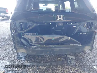 2014 Honda Odyssey Touring with VIN 5FNRL5H94EB110590, listed as a IAAI auction lot 42092929 with 242,338 mi miles and . Bid and sale history available at DreamBid. Image 6.