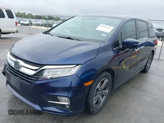 2018 Honda Odyssey Touring with VIN 5FNRL6H85JB001501, listed as a IAAI auction lot 41911497 with 92,407 mi miles. Bid and sale history available at carsss.com. Image 18.