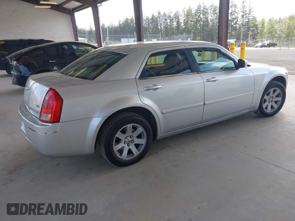 2005 Chrysler 300 Touring with VIN 2C3JA53G75H687752, listed as a IAAI auction lot 42190758 with 170,269 mi miles and . Bid and sale history available at DreamBid. Image 4.