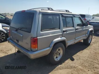 2001 Jeep Cherokee Sport z VIN 1J4FF58S61L540796, wystawiony jako Copart lot #62384895 z przebiegiem 209 294 mil mil oraz Czysty tytuł • Clean title. Historia ofert i sprzedaży dostępna na DreamBid. Obrazek 3.
