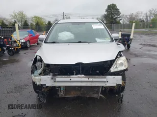 2009 Mazda Mazda5 Sport with VIN JM1CR293490334170, listed as a IAAI auction lot 41972688 with 125,137 mi miles. Bid and sale history available at carsss.com. Image 12.