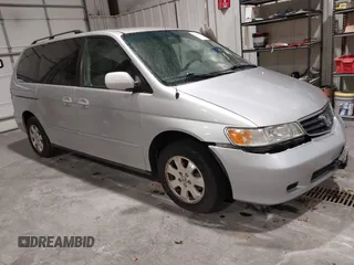2003 Honda Odyssey EX with VIN 5FNRL18673B009670, listed as a IAAI auction lot 42130172 with 218,391 mi miles and . Bid and sale history available at carsss.com. Image 1.