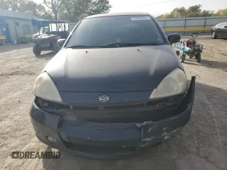 2003 Suzuki Aerio SX z VIN JS2RC41H135205642, wystawiony jako Copart lot #77690224 z przebiegiem 161 414 mil mil oraz Szkoda całkowita • Salvage title. Historia ofert i sprzedaży dostępna na DreamBid. Obrazek 5.