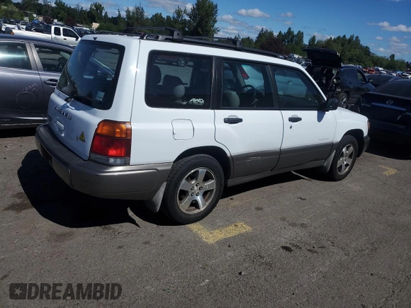 1999 Subaru Forester S with VIN JF1SF6557XH703160, listed as a Copart auction lot 60076974 with 0 mi miles and Salvage Title. Bid and sale history available at carsss.com. Image 3.
