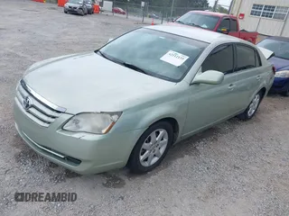 2007 Toyota Avalon XL with VIN 4T1BK36B07U186506, listed as a IAAI auction lot 42112135 with 180,210 mi miles and . Bid and sale history available at DreamBid. Image 2.