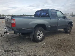 1995 Toyota T100 z VIN JT4VD22E9S0004095, wystawiony jako Copart lot #52683765 z przebiegiem 564 413 mil mil oraz Szkoda całkowita • Salvage title. Historia ofert i sprzedaży dostępna na DreamBid. Obrazek 3.