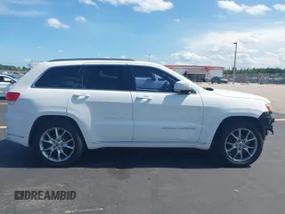 2015 Jeep Grand Cherokee Summit with VIN 1C4RJEJG5FC105038, listed as a IAAI auction lot 42555024 with 133,077 mi miles and . Bid and sale history available at DreamBid. Image 14.