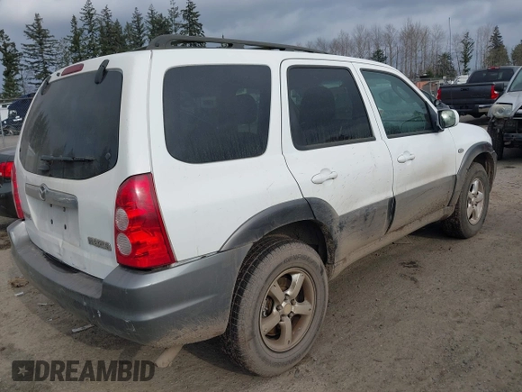 2005 Mazda Tribute LX with VIN 4F2CZ94105KM25420, listed as a IAAI auction lot 41450750 with 148,736 mi miles. Bid and sale history available at carsss.com. Image 4.