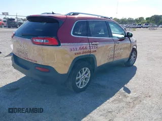 2015 Jeep Cherokee Latitude with VIN 1C4PJLCB0FW643402, listed as a IAAI auction lot 41811328 with 110,232 mi miles and . Bid and sale history available at DreamBid. Image 4.
