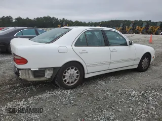 2000 Mercedes-Benz E-Class with VIN WDBJF70J1YB078418, listed as a Copart auction lot 71177244 with 189,838 mi miles and Salvage Title. Bid and sale history available at carsss.com. Image 3.